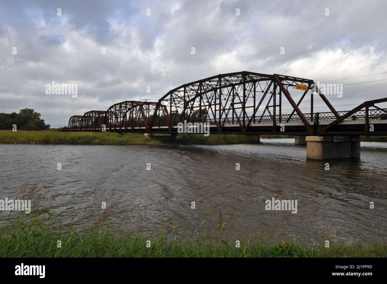 Opened in 1925, the landmark Lake Overholser Bridge near Oklahoma City carried Route 66 traffic until a wider segment was built in 1958. Stock Photo