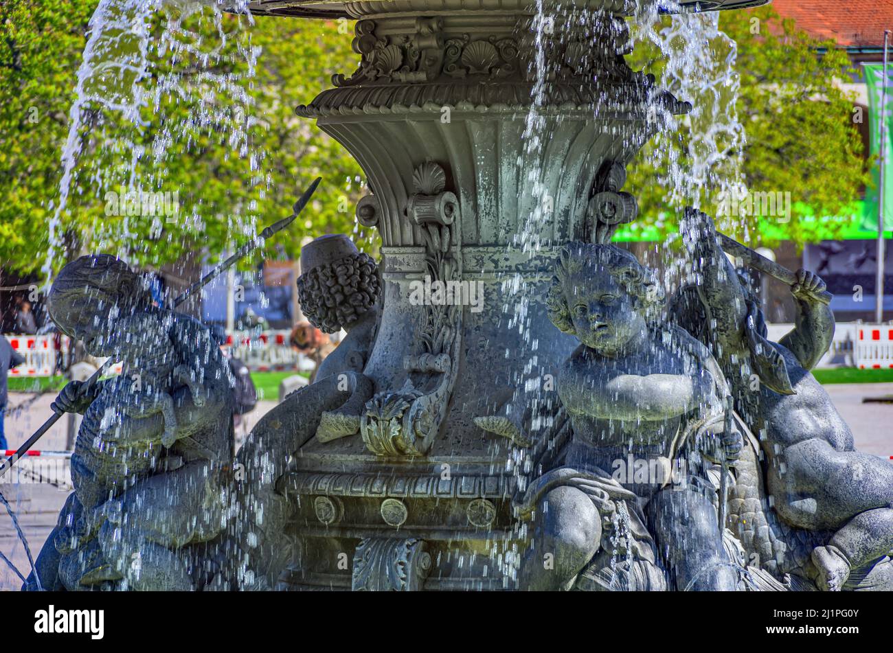 Fountain with putti on Schlossplatz in front of New Palace (Neues Schloss) in Stuttgart, Baden-Württemberg, Germany. Stock Photo