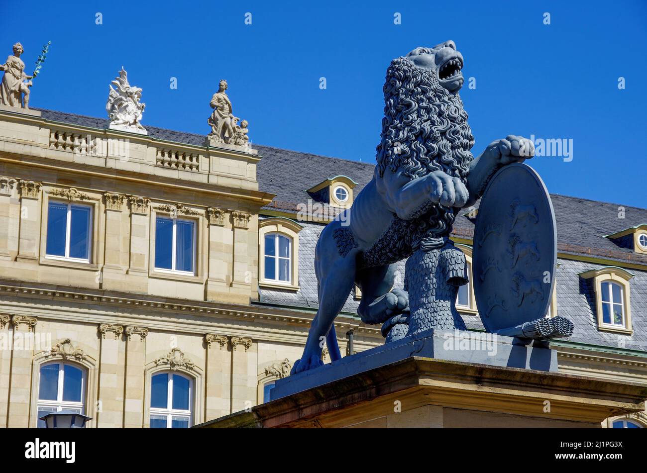 Stuttgart, Baden-Württemberg, Germany: Life-size statue of a lion at the entrance to the courtyard of the New Palace (Neues Schloss). Stock Photo