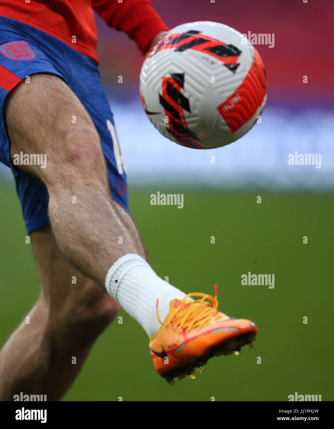 London, UK. 26th Mar, 2022. A close up of leg and boots of Jack Grealish of England as he kicks football during pre match warm up. England v Switzerland, International football friendly designated Alzheimer's Society International match at Wembley Stadium in London on Saturday 26th March 2022. Editorial use only. pic by Andrew Orchard/Andrew Orchard sports photography/Alamy Live News Credit: Andrew Orchard sports photography/Alamy Live News Stock Photo