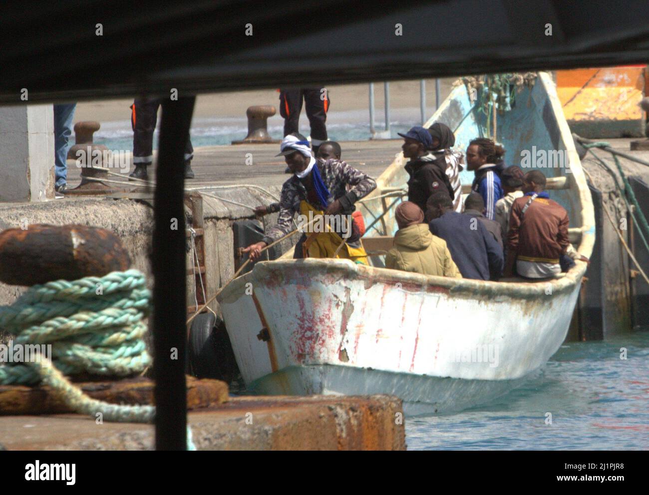 Tenerife, Spain. 27th Mar, 2022. Arrival of a small boat to the Christians with 12 male migrants from Mali, Senegal and Mauritania all in good health, they had been at sea for 7 days. (Credit Image: © Mercedes Menendez/Pacific Press via ZUMA Press Wire) Credit: ZUMA Press, Inc./Alamy Live News Stock Photo