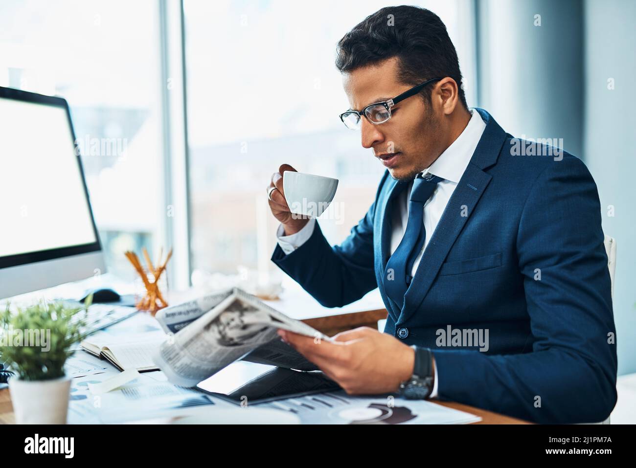 Commencing with his morning routine. Shot of a focused young ...