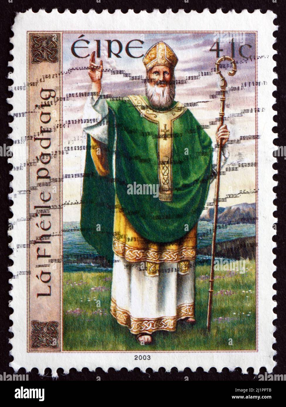 IRELAND - CIRCA 2003: A stamp printed in Ireland shows St. Patrick, St. Patrick's Day, Romano-British Christian Missionary and Bishop in Ireland, circ Stock Photo