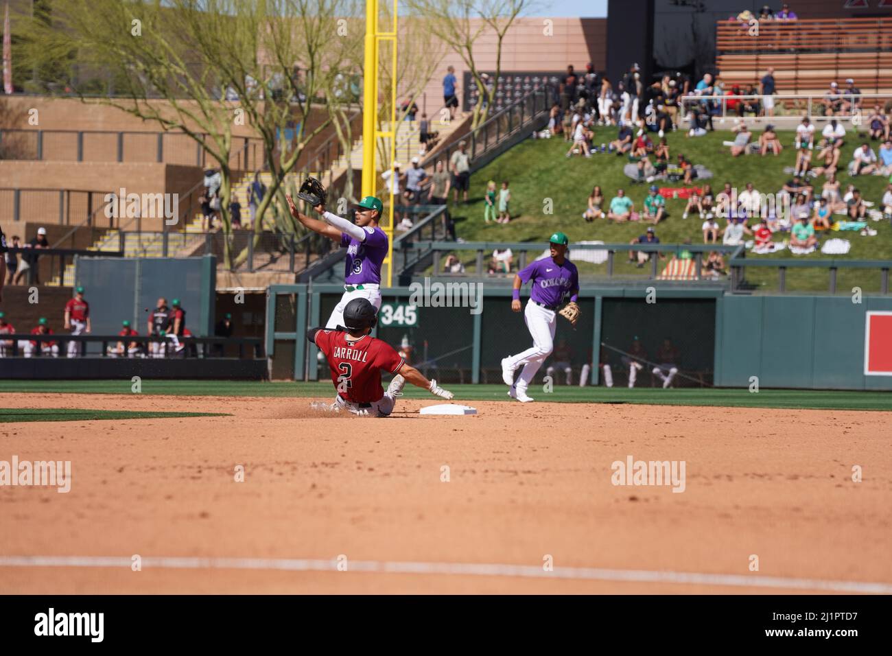 Scottsdale, United States. 17th Mar, 2022. Colorado Rockies baserunner  talks to first base coach during a MLB spring training baseball game on  Thursday Mar. 17, 2022, at Salt River Fields in Scottsdale