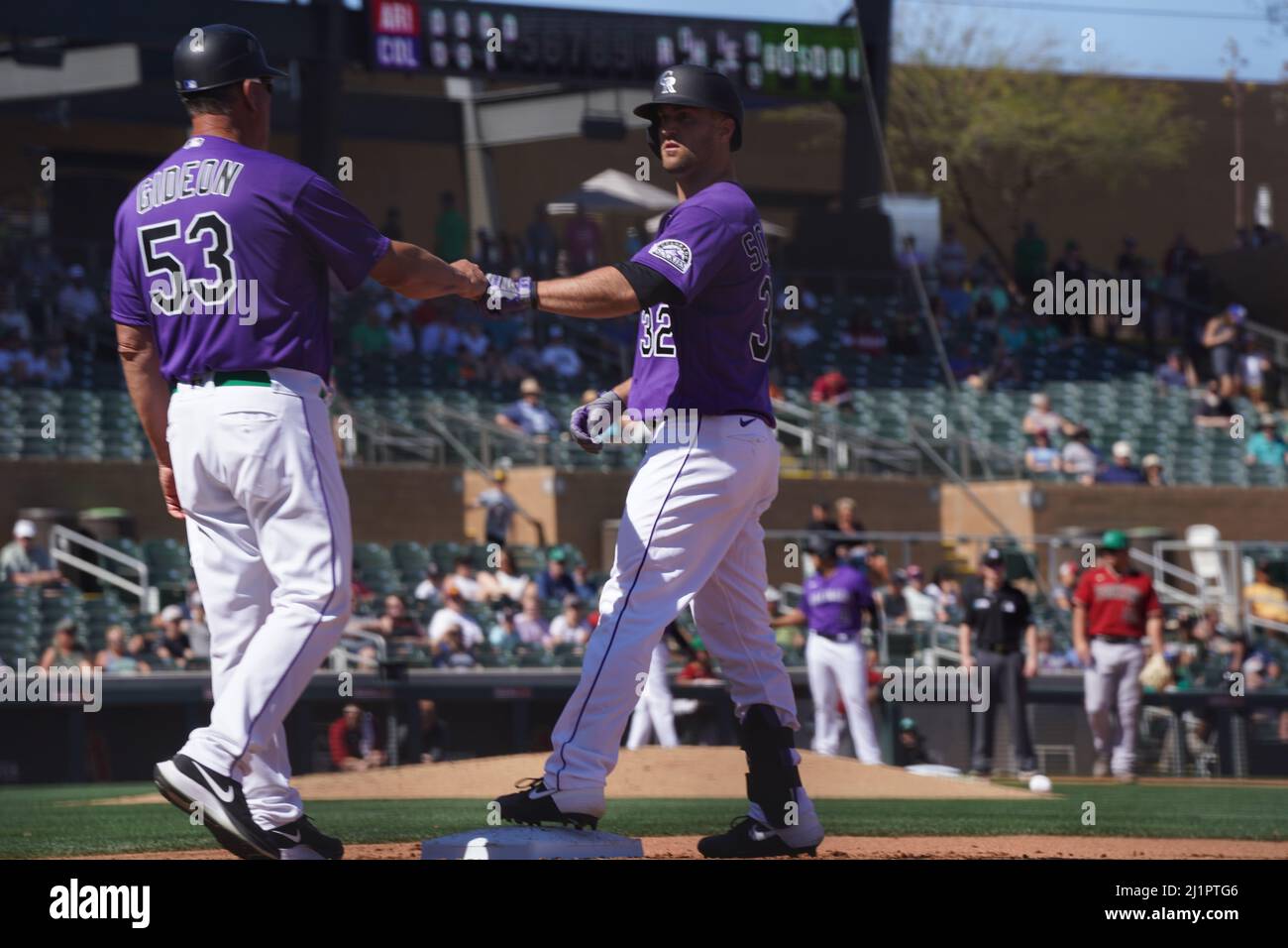 Scottsdale, United States. 17th Mar, 2022. Colorado Rockies baserunner  talks to first base coach during a MLB spring training baseball game on  Thursday Mar. 17, 2022, at Salt River Fields in Scottsdale