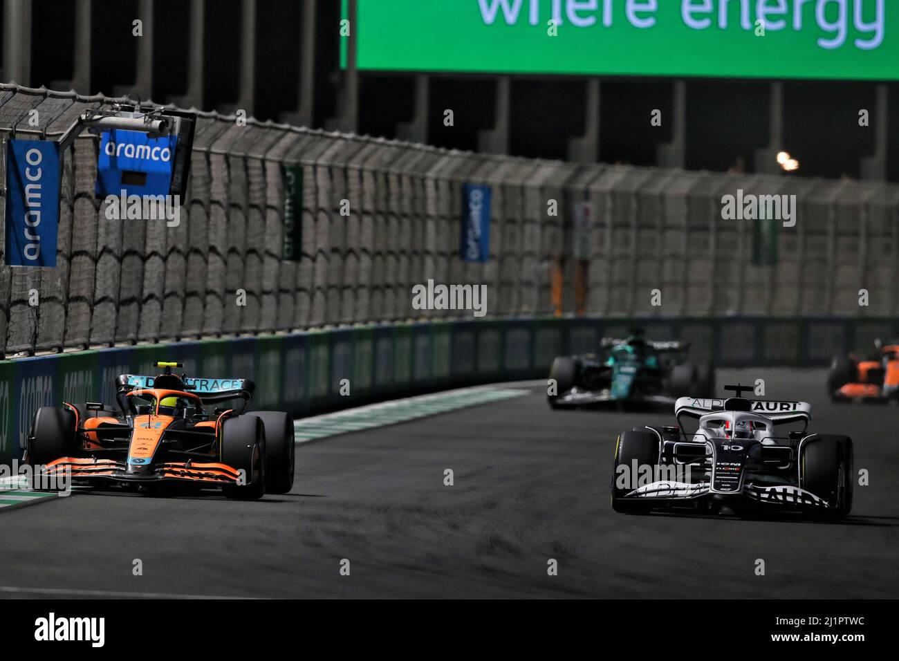 Lando Norris (GBR) McLaren MCL36 and Pierre Gasly (FRA) AlphaTauri AT03 battle for position