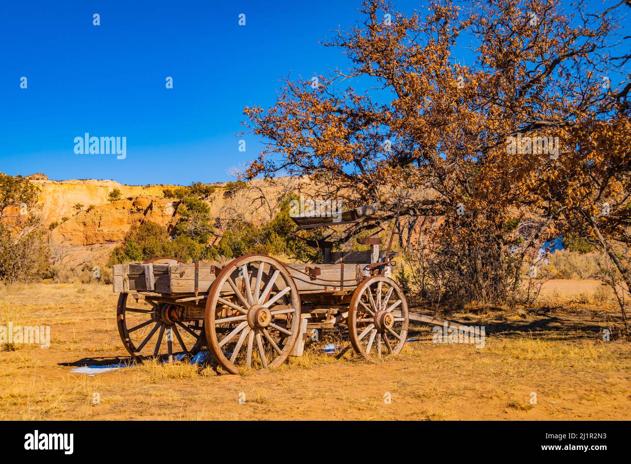 old wooden cart on the western landscape of New Mexico Stock Photo