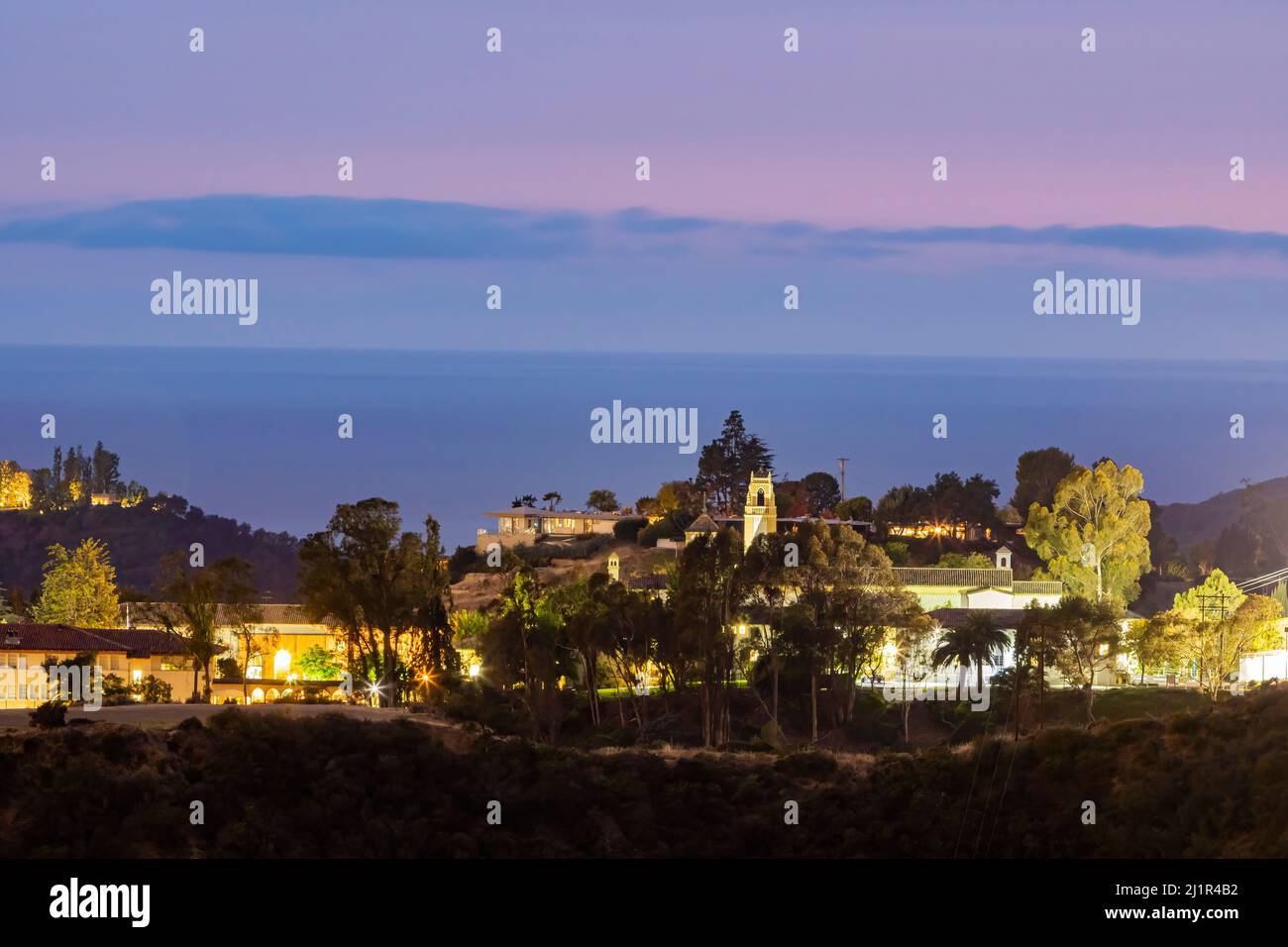 Twilight view of a beautiful mansion from Getty View Park at California
