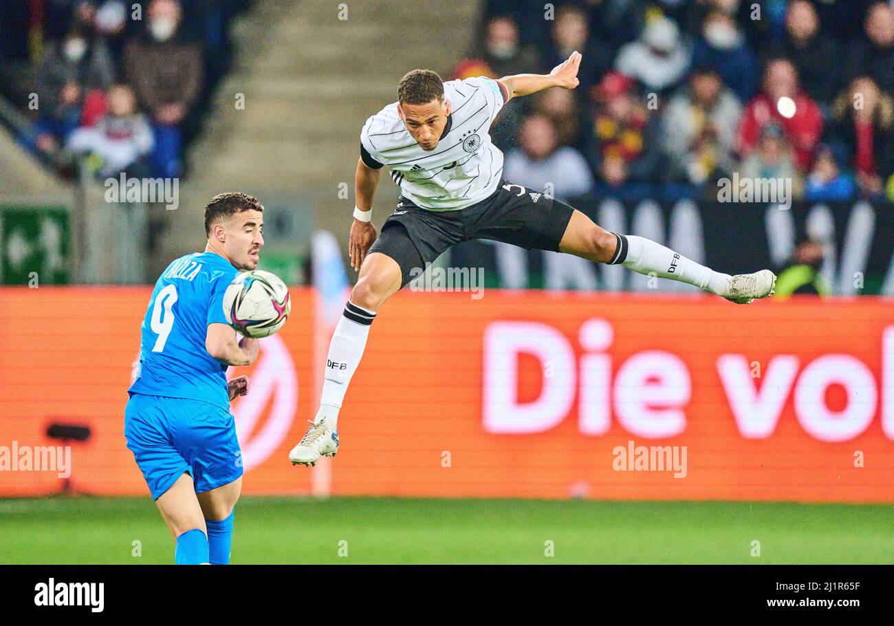 Sinsheim, Germany. 26th Mar, 2022. Thilo Kehrer, DFB 5  compete for the ball, tackling, duel, header, zweikampf, action, fight against Matan Baltaxa, Israel 5  in the friendly match GERMANY - ISRAEL 2-0 Preparation for World Championships 2022 in Qatar ,Season 2021/2022, on Mar 26, 2022  in Sinsheim, Germany.  © Peter Schatz / Alamy Live News Credit: Peter Schatz/Alamy Live News Stock Photo