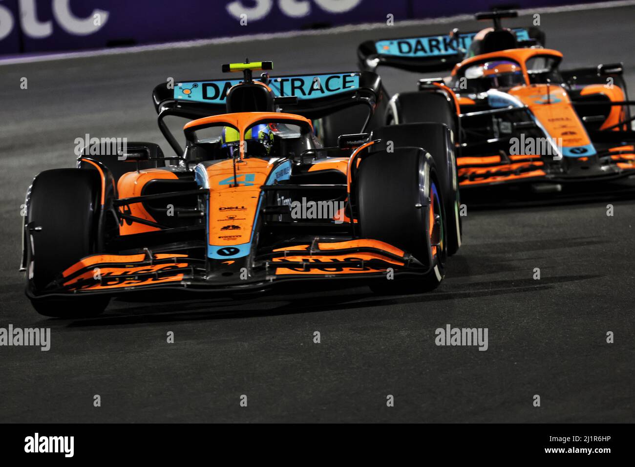 Jeddah, Saudi Arabia. 27th Mar, 2022. Lando Norris (GBR) McLaren MCL36 leads team mate Daniel Ricciardo (AUS) McLaren MCL36