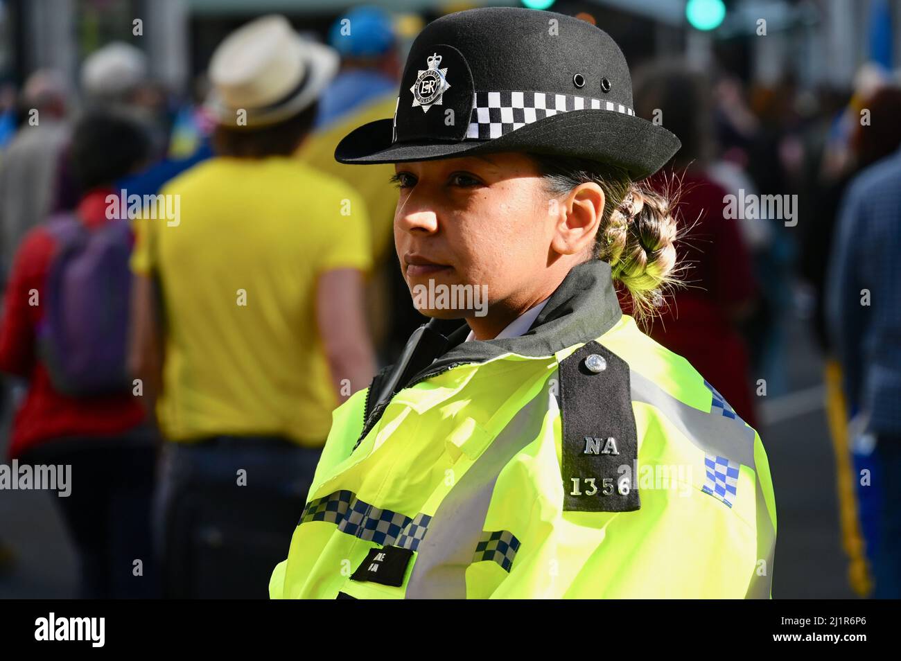 Met Police Officer, London Stands with Ukraine March and Rally, Park Lane to Trafalgar Square, London. UK Stock Photo
