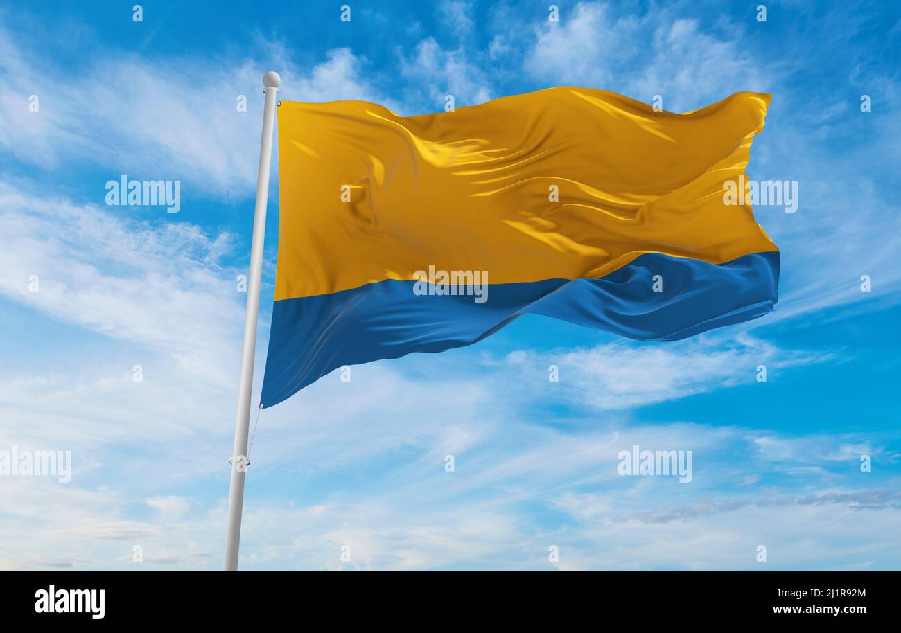 flag of Opole Voivodeship, wojewodztwo opolskie , Poland at cloudy sky background on sunset, panoramic view. Polish travel and patriot concept. copy s Stock Photo