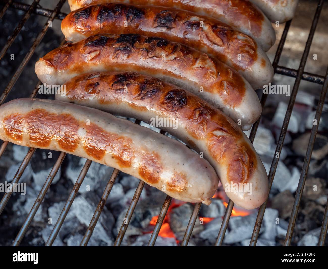 fresh bratwurst on the grill Stock Photo