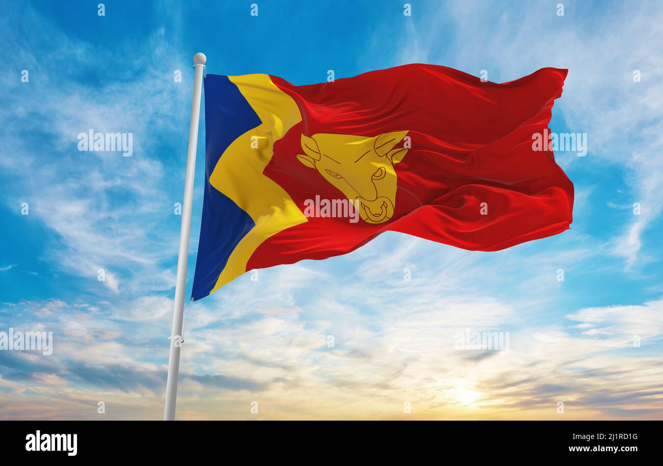 flag of Birmingham , UK at cloudy sky background on sunset, panoramic