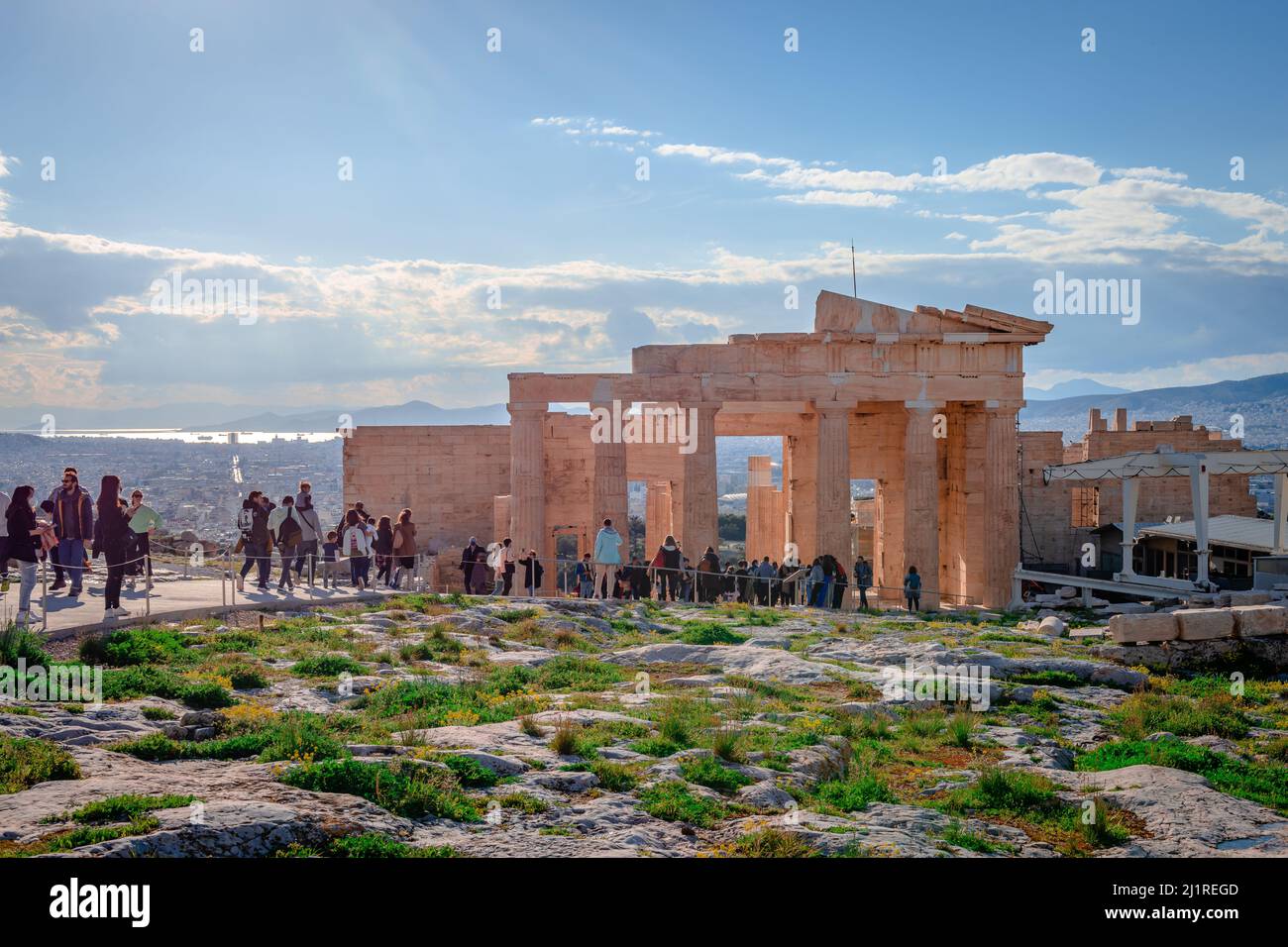 The Propylaea, the monumental gateway to the Acropolis of Athens, with breathtaking view to Pireaus and the sea. Athens, Greece. Stock Photo