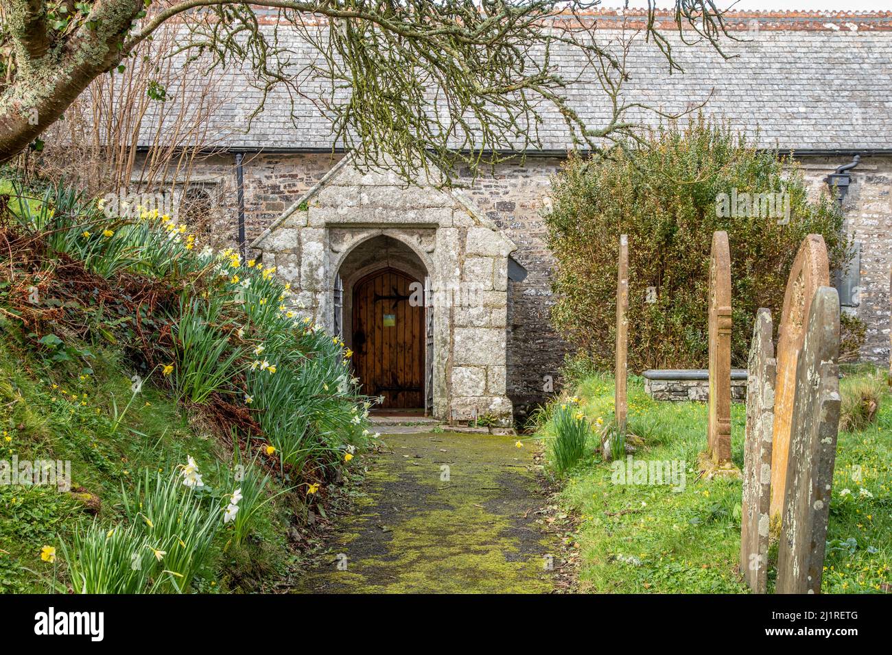 The church door of the Parish Church of Saint Genesius at St Gennys, Cornwall, England, UK Stock Photo