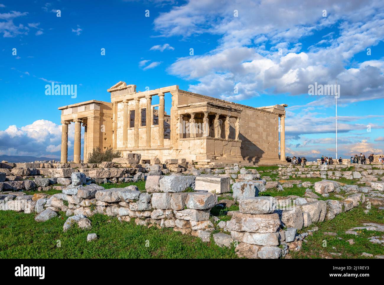 The Erechtheion, an ancient Greek temple on the north side of the Acropolis, dedicated to Goddess Athena and God Poseidon. Athens, Greece. Stock Photo