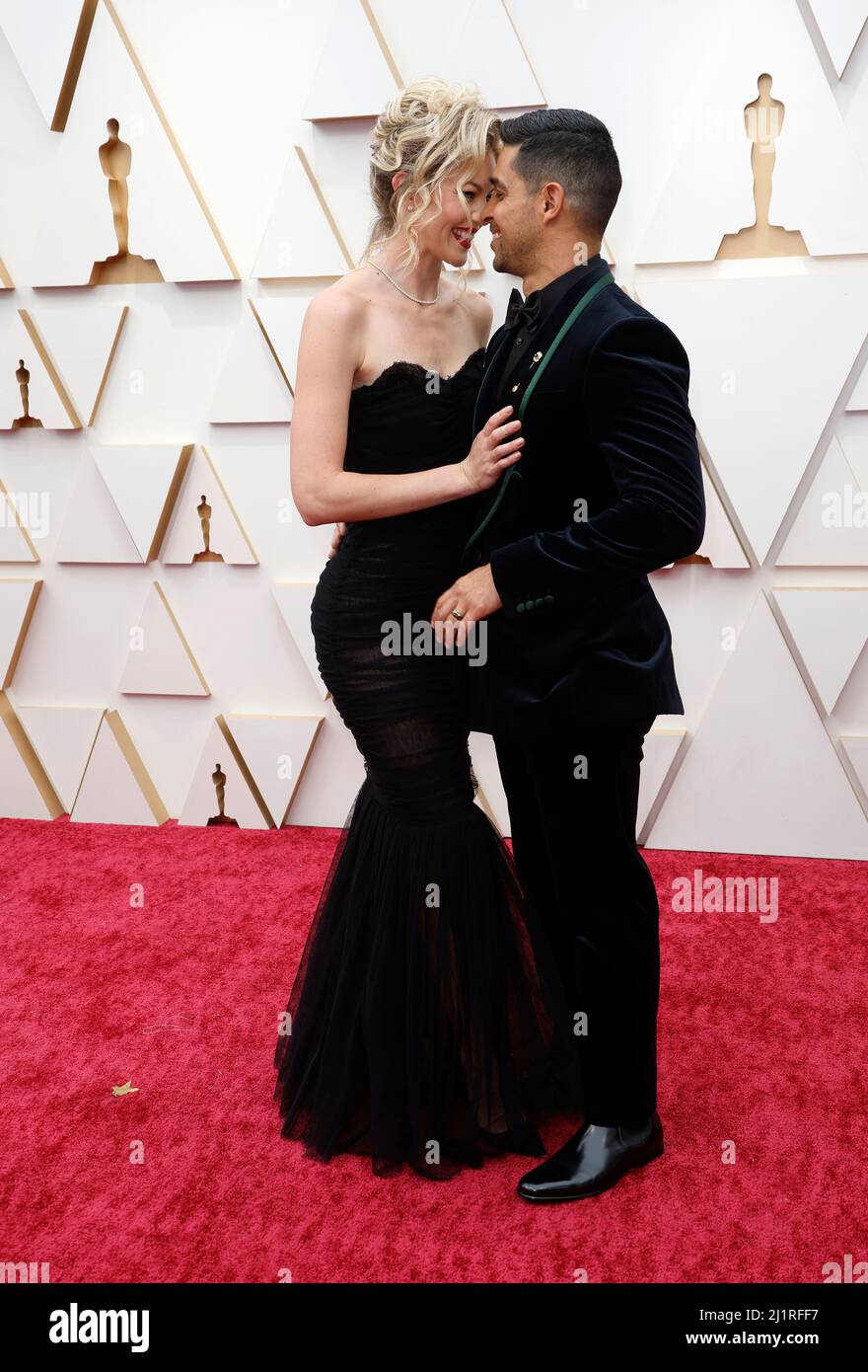 Wilmer Valderrama and wife Amanda Pacheco pose on the red carpet during