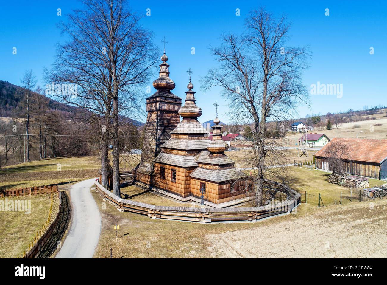 St. Paraskevi wooden church in Kwiatoń, Poland.  A wooden church built in 17th century. Originally an eastern orthodox church (tserkva), now a Roman C Stock Photo