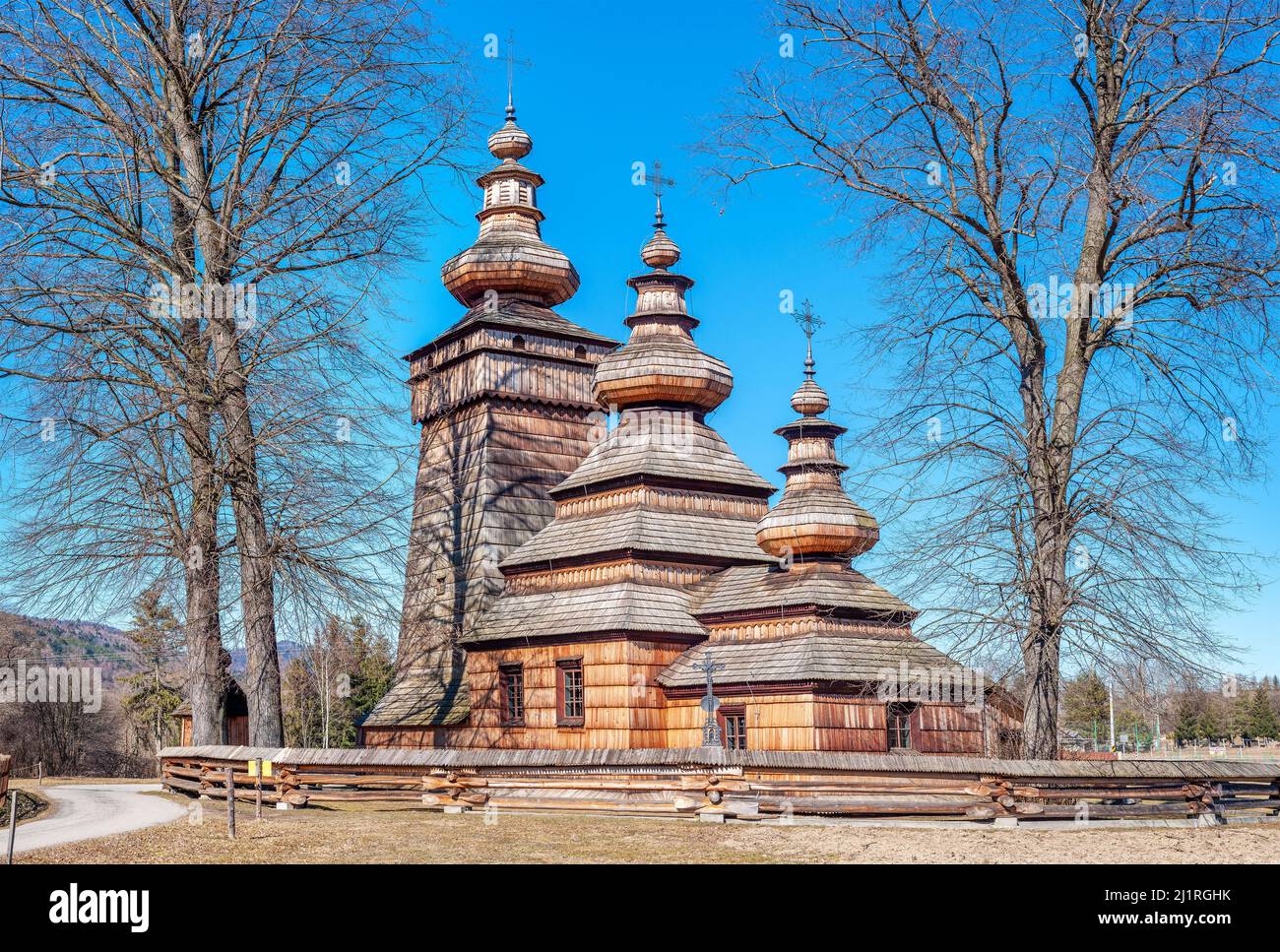 St. Paraskevi wooden church in Kwiatoń, Poland.  Built in 17th century. Originally an eastern orthodox church (tserkva), now a Roman Catholic church. Stock Photo