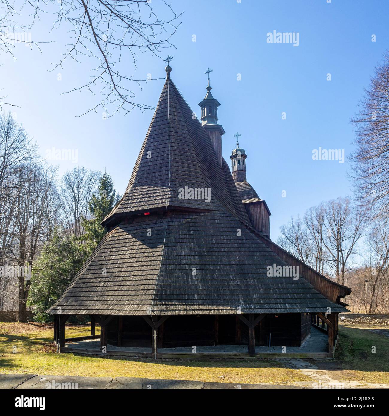 Saints Philip and James Gothic wooden church in Sękowa from the 15th century. UNESCO Wooden Churches of Southern Lesser Poland. Wooden soboty (undercu Stock Photo
