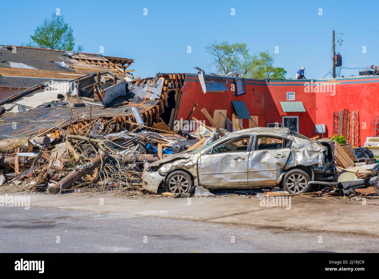 ARABI, LA, USA MARCH 26, 2022 Collapsed house, debris and severely
