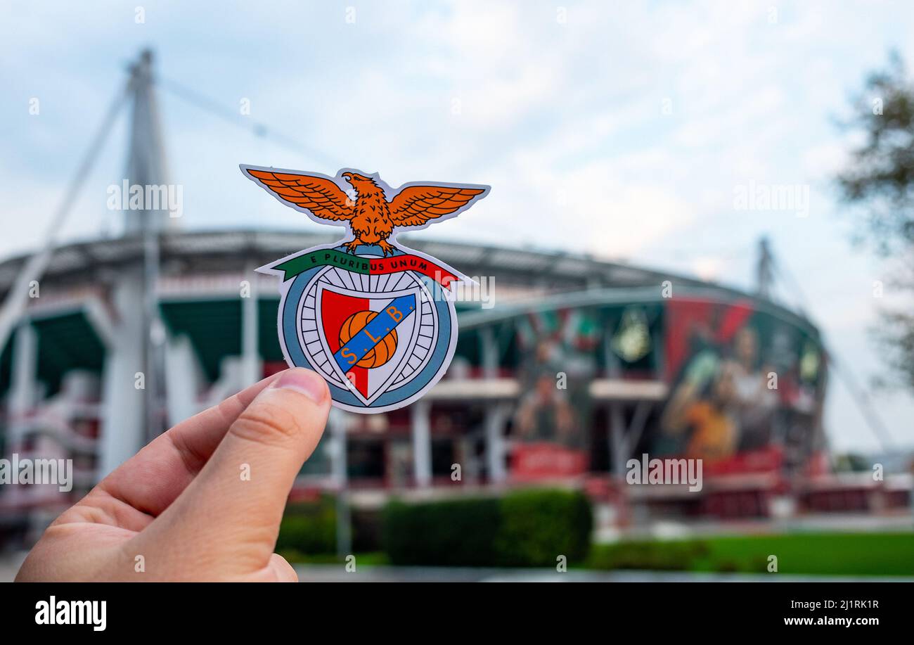 August 30, 2021, Lisbon, Portugal. S.L. football club emblem Benfica against the backdrop of a modern stadium. Stock Photo