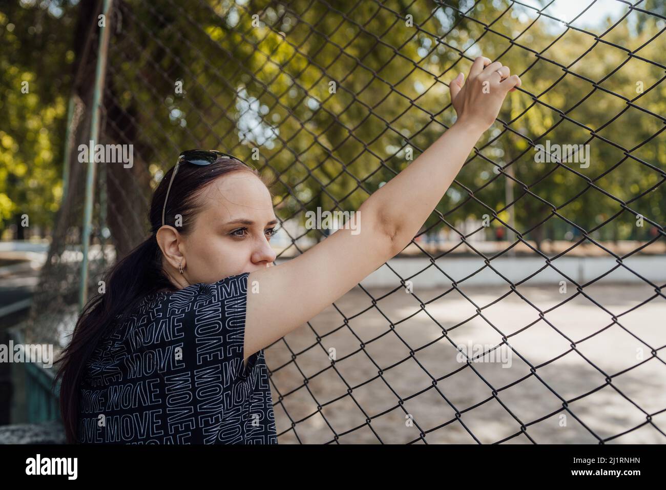 The hands on the lattice are symbolize limitation in something. Stock Photo