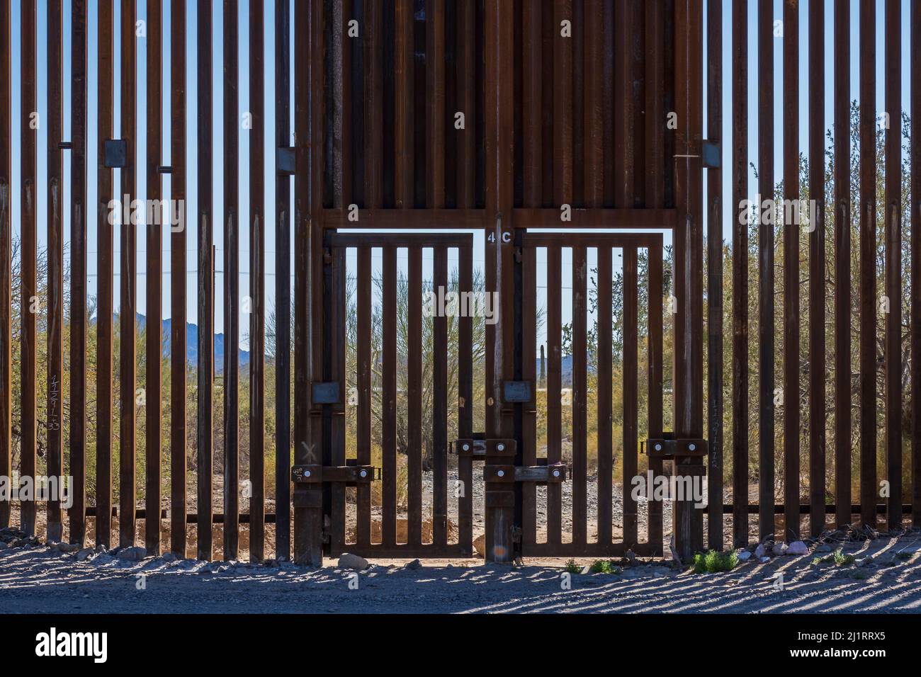 Gate in Trump's border Wall, Puerto Blanco Loop Drive, Organ Pipe Cactus National Monument, Arizona. Stock Photo