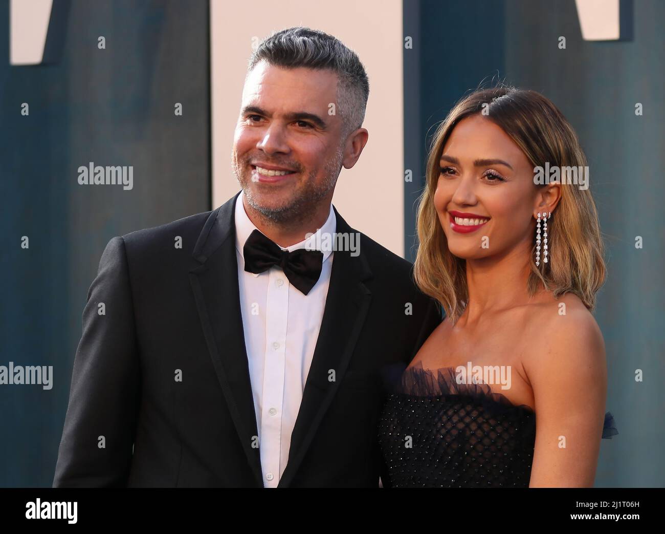 Jessica Alba and Cash Warren arrive at the Vanity Fair Oscar party during the 94th Academy Awards in Beverly Hills, California, U.S., March 27, 2022. REUTERS/Danny Moloshok Stock Photo