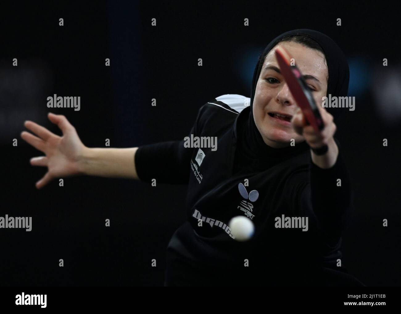 Doha, Qatar. 27th Mar, 2022. Dina Meshref of Egypt hits a return during ...