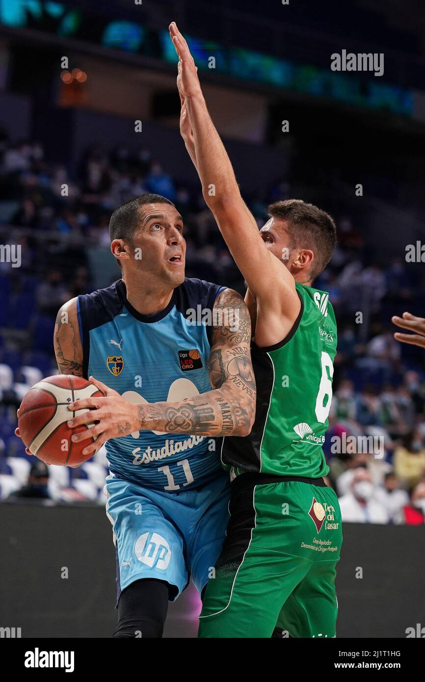 Madrid, Spain. 27th Mar, 2022. Nacho Martín (L) of Movistar Estudiantes seen in action during the LEB Oro 2021-22 league match between Movistar Estudiantes and Caceres Basketball at the Palacio de los Deportes in Madrid. (Final score; Movistar Estudiantes 83-76 Cáceres Basketball) Credit: SOPA Images Limited/Alamy Live News Stock Photo