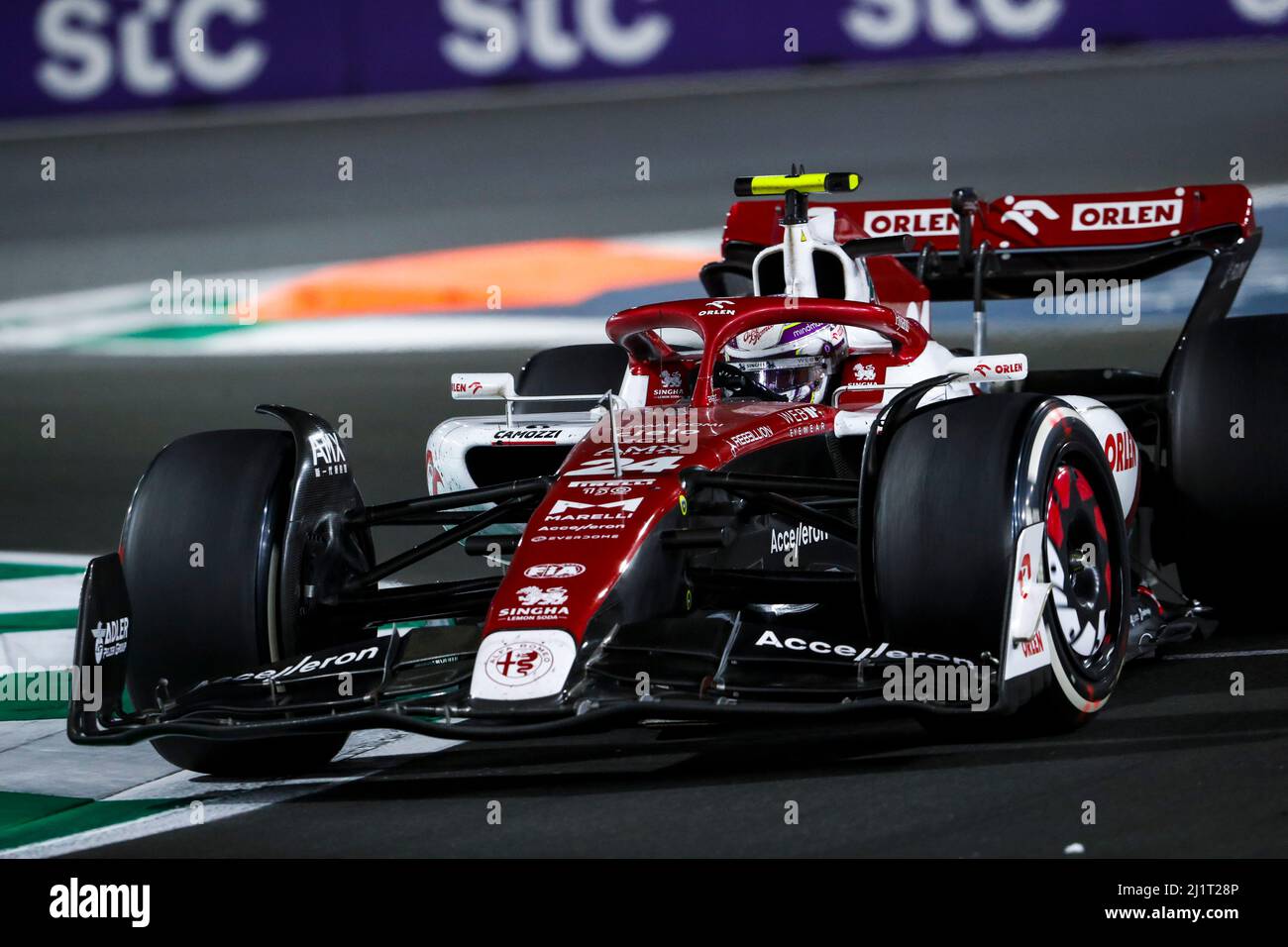 Jeddah, Saudi Arabia. 28th Mar, 2022.  Alfa Romeo's Chinese driver Zhou Guanyu competes during the 2022 Saudi Arabian Grand Prix at Jeddah Corniche Circuit in Jeddah, Saudi Arabia on March 27, 2022. (DPPI/Handout via Xinhua) Credit: Xinhua/Alamy Live News Stock Photo