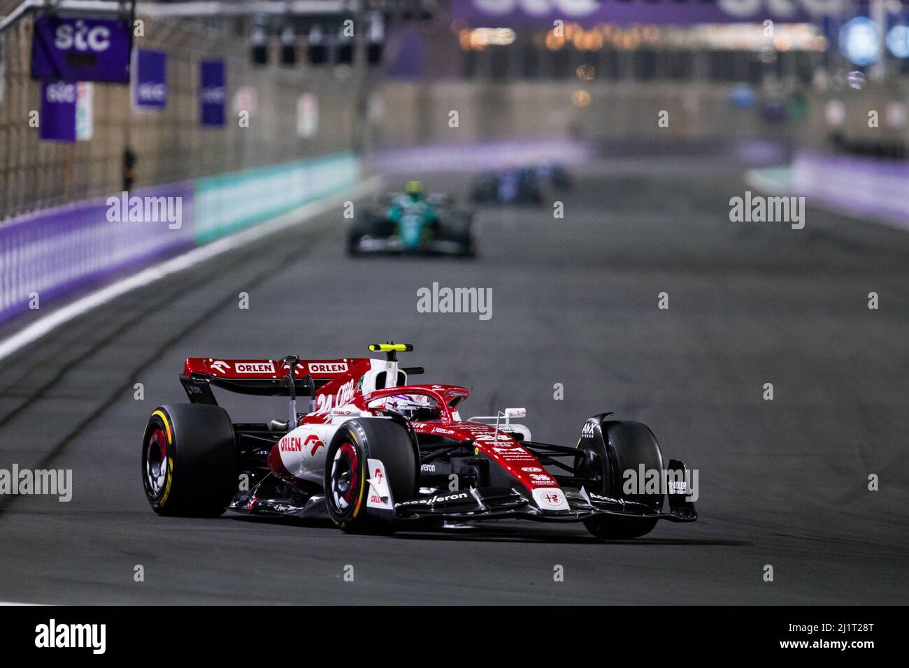 Jeddah, Saudi Arabia. 28th Mar, 2022.  Alfa Romeo's Chinese driver Zhou Guanyu competes during the 2022 Saudi Arabian Grand Prix at Jeddah Corniche Circuit in Jeddah, Saudi Arabia on March 27, 2022. (DPPI/Handout via Xinhua) Credit: Xinhua/Alamy Live News Stock Photo