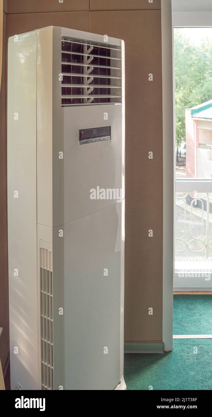 Vertical split system column air conditioner closeup for office, industrial premises and gyms