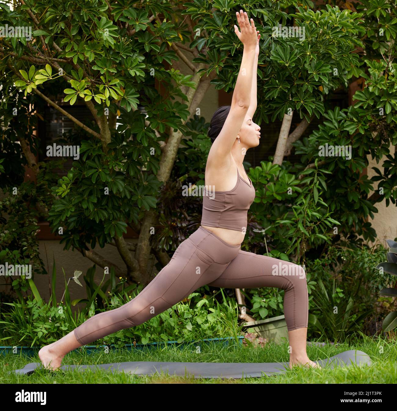 Movement is a great stress reliever. Shot of a young woman exercising outdoors. Stock Photo