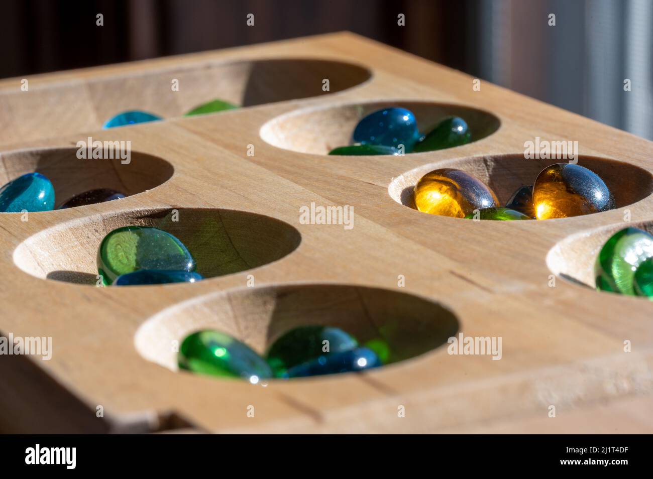 Mancala Stones On Board Stock Photo - Download Image Now - Marbles