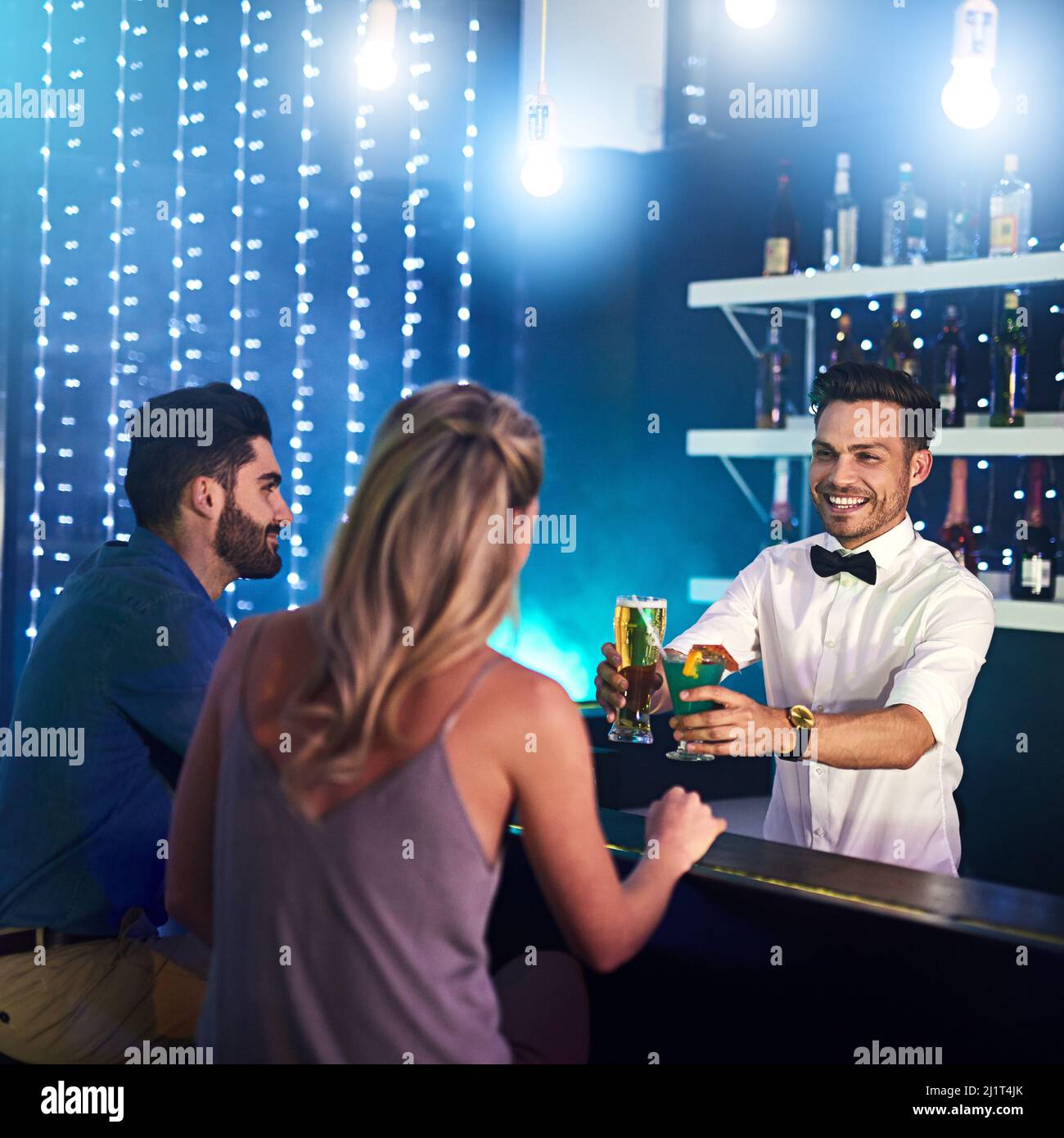 Man holding drink nightclub hi-res stock photography and images - Page 6 -  Alamy