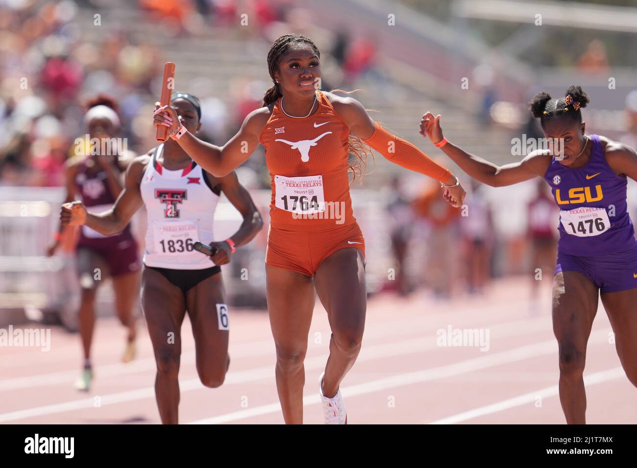 Kynnedy Flannel of Texas (1764) defeats Favour Ofili of LSU (1476) on the anchor leg of the women's 4x100m relay, 42.83 to 42.97, during the 94th Clyd Stock Photo