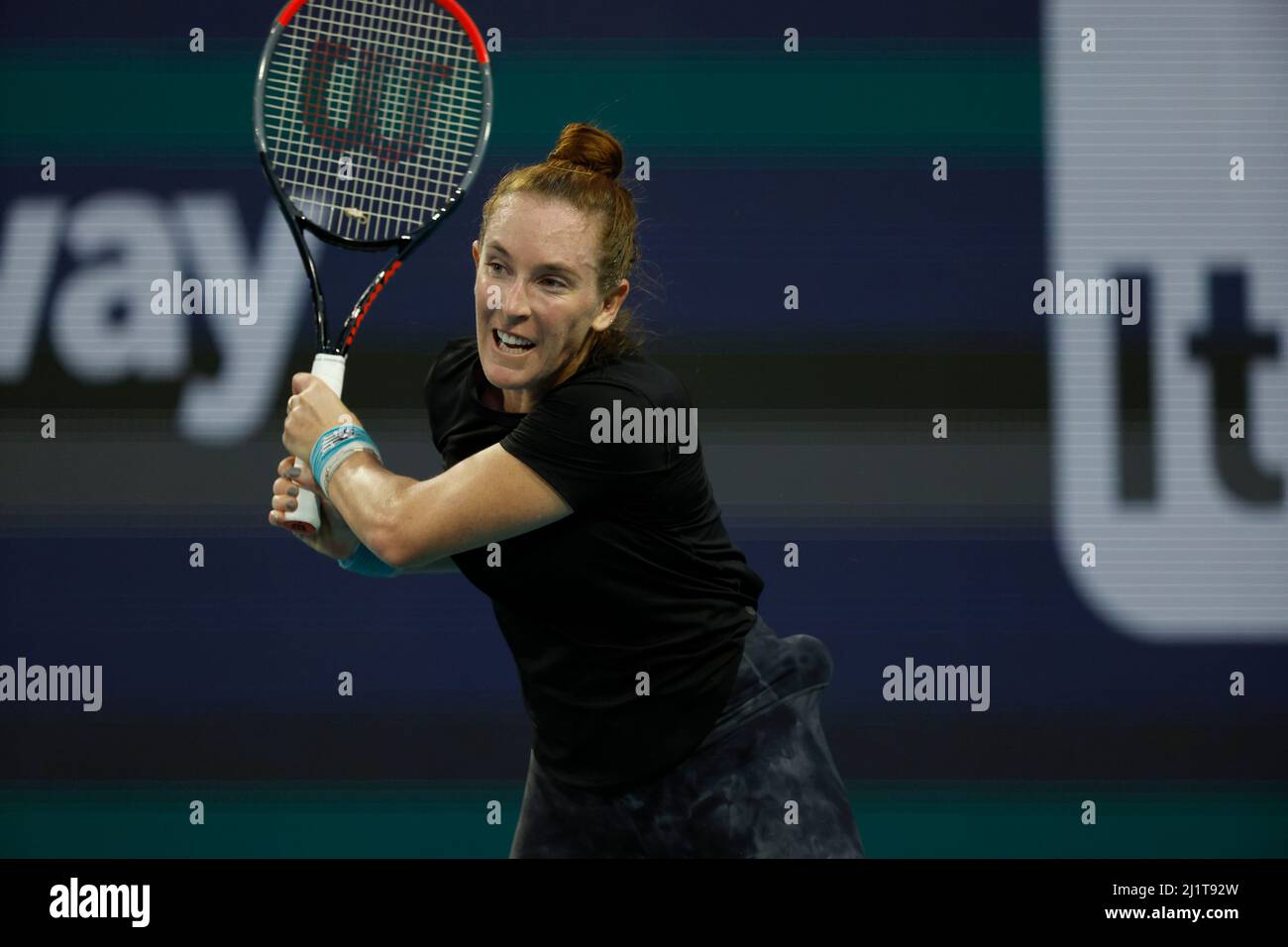 Miami Gardens, Florida, USA. 27th Mar, 2022. Iga Swiatek of Poland defeats Madison Brengle of United States during the 2022 Miami Open presented by Itaú at Hard Rock Stadium on March 27, 2022 in Miami Gardens, Florida People: Madison Brengle Credit: Hoo Me/Media Punch/Alamy Live News Stock Photo