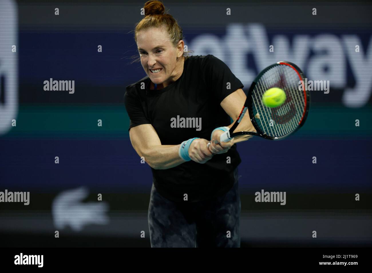 Miami Gardens, Florida, USA. 27th Mar, 2022. Iga Swiatek of Poland defeats Madison Brengle of United States during the 2022 Miami Open presented by Itaú at Hard Rock Stadium on March 27, 2022 in Miami Gardens, Florida People: Madison Brengle Credit: Hoo Me/Media Punch/Alamy Live News Stock Photo