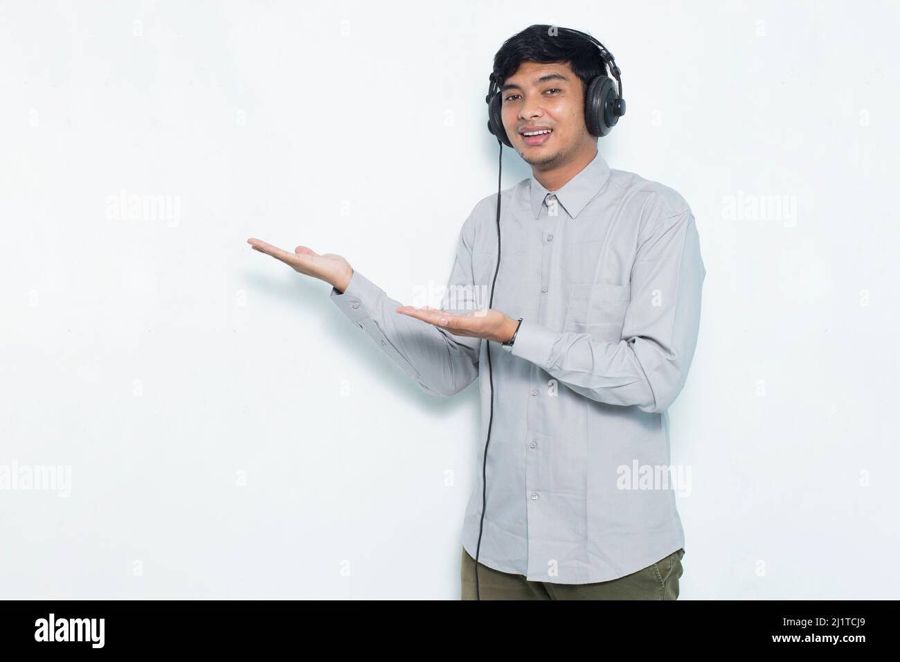 Asian man operator customer service pointing with fingers to different ...