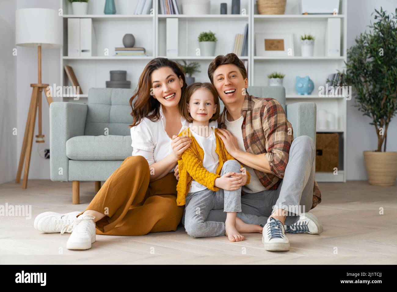 Happy family! Child daughter with mother and father. Mum, dad and girl ...