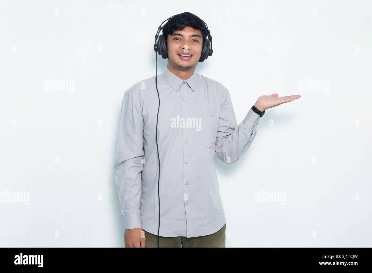 Asian man operator customer service pointing with fingers to different ...
