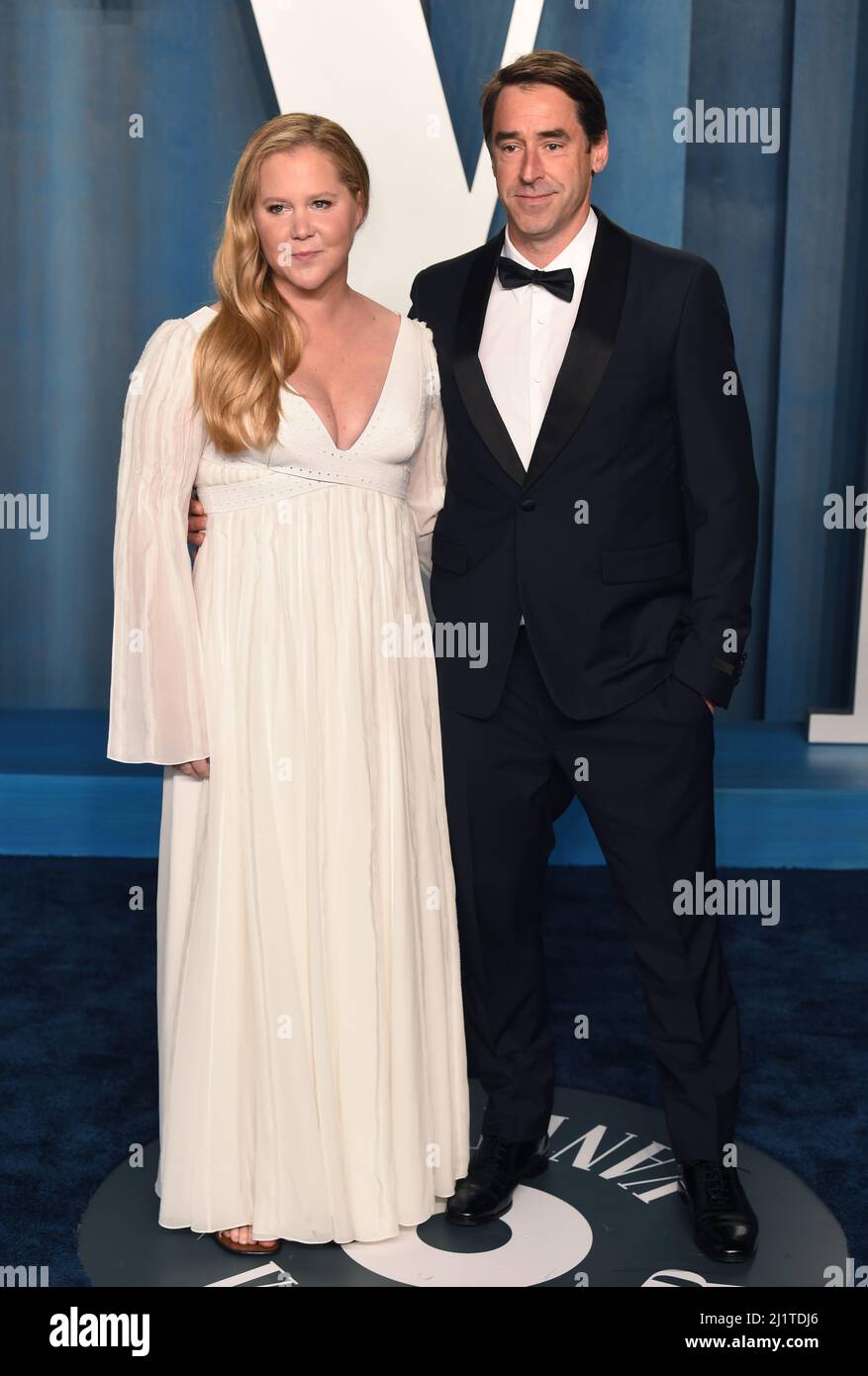 Amy Schumer and Chris Fischer attending the Vanity Fair Oscar Party held at the Wallis Annenberg Center for the Performing Arts in Beverly Hills, Los Angeles, California, USA. Picture date: Sunday March 27, 2022. Stock Photo