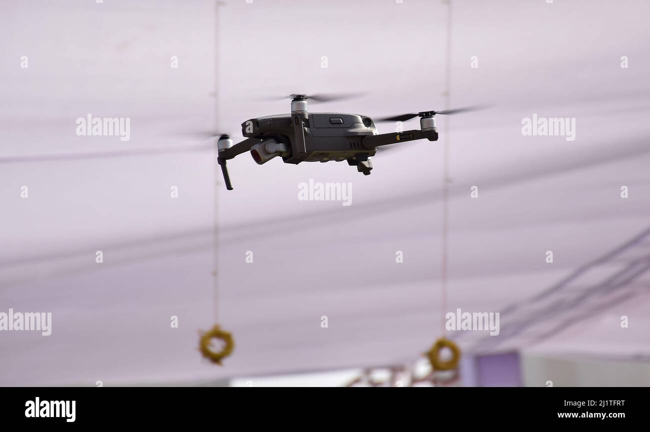 Remote controlled drone flying at an event Stock Photo Alamy