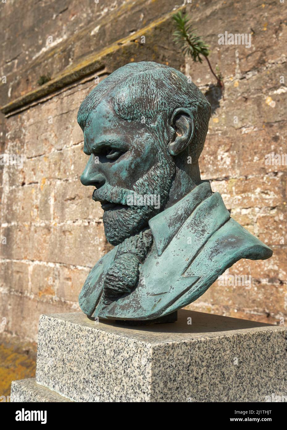 Old bronze statue of a historical figure Stock Photo
