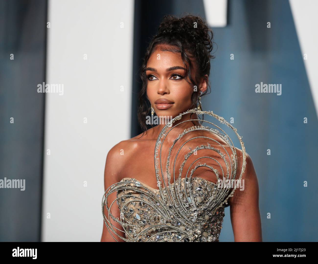 Lori Harvey arrives at the Vanity Fair Oscar party during the 94th