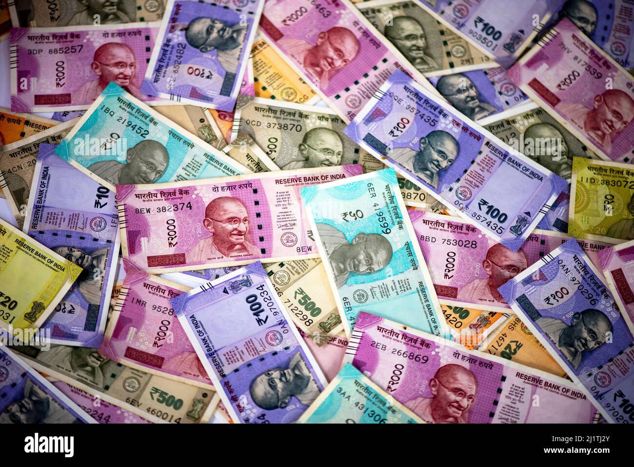 Cash in various Indian Paper Currency (rupees) as a background. Indian banknotes. Stock Photo