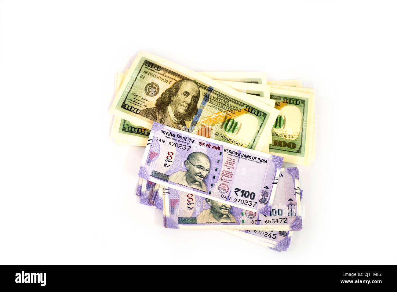 exchange rate. Dollar and Indian paper currency against white background Stock Photo